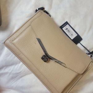Botkier crossbody NWT just 1 small stain in main picture. 1 Strap Inside